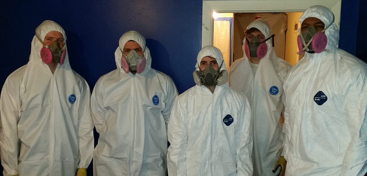 Signs of Water Damage in a Home: What You Need to Know 25 water damage restoration Phoenix specialists standing with mold remediation gear on